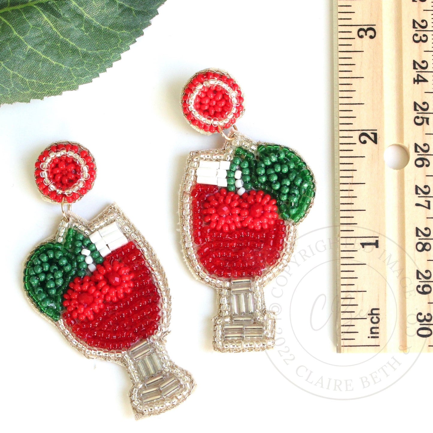cherry drink beaded earrings next to ruler showing 2.75 inches length